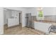 Bright kitchen featuring stainless steel appliances, white cabinetry, and modern countertops at 175 Cypress Ln., Little River, SC 29566