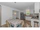 Bright eat-in kitchen with stainless steel appliances and modern backsplash at 175 Cypress Ln., Little River, SC 29566