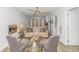 Cozy living room features neutral tones, stylish furniture, and a decorative ceiling fan at 175 Cypress Ln., Little River, SC 29566