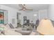 Cozy living room featuring stylish furniture and a decorative ceiling fan at 175 Cypress Ln., Little River, SC 29566