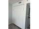 Murphy bed folded into the wall of a bedroom with hardwood floors at 201 S Ocean Blvd. # 408, Myrtle Beach, SC 29577