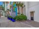 Exterior building entrance with resort signage and landscaping at 201 S Ocean Blvd. # 616, Myrtle Beach, SC 29577