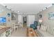 Cozy living room featuring beach decor, dining space, and comfortable seating at 201 S Ocean Blvd. # 616, Myrtle Beach, SC 29577