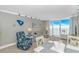 Living room with dining space, comfortable seating, and a view at 201 S Ocean Blvd. # 616, Myrtle Beach, SC 29577