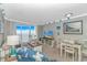 Living room with dining space, comfortable seating, and a view at 201 S Ocean Blvd. # 616, Myrtle Beach, SC 29577