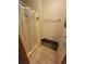 Cozy bathroom with tiled floors, shower, and seated bench with granite top at 207 Double Eagle Dr. # E-1, Surfside Beach, SC 29575
