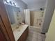 Bathroom featuring tiled floor, neutral colored walls, and walk-in shower at 207 Double Eagle Dr. # E-1, Surfside Beach, SC 29575