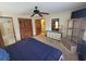 Comfortable bedroom with walk-in closet, ensuite bathroom, and dresser at 207 Double Eagle Dr. # E-1, Surfside Beach, SC 29575