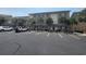 Multi-story condo with brick veneer and palm trees near the parking lot at 207 Double Eagle Dr. # E-1, Surfside Beach, SC 29575