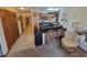 Open concept living space featuring a connected kitchen and hallway at 207 Double Eagle Dr. # E-1, Surfside Beach, SC 29575