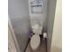 Toilet area showcasing tile floors and a shelf above the toilet at 207 Double Eagle Dr. # E-1, Surfside Beach, SC 29575