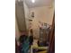 Utility room featuring mechanical equipment, including an AC unit and hot water heater at 207 Double Eagle Dr. # E-1, Surfside Beach, SC 29575