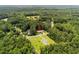 Aerial view of property showcasing the home and surrounding lush greenery and trees at 2135 Starduster Ln., Little River, SC 29566