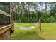 Relaxing hammock in backyard surrounded by the beautiful forest at 2135 Starduster Ln., Little River, SC 29566