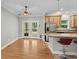 Kitchen features a breakfast bar, wood cabinets and stainless steel appliances and overlooks the deck at 2135 Starduster Ln., Little River, SC 29566