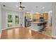 Eat-in kitchen features wood cabinets, stainless steel appliances, and a breakfast bar with seating at 2135 Starduster Ln., Little River, SC 29566