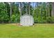 Charming storage shed in backyard, providing extra space for tools, equipment, or hobbies at 2135 Starduster Ln., Little River, SC 29566