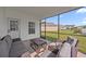 Inviting screened-in porch with comfortable seating for enjoying outdoor living at 2143 Stonecrest Dr. Nw, Calabash, NC 28467