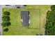 Aerial view showcasing the home, fenced-in yard, and surrounding greenery at 241 Fannie B Rd., Conway, SC 29526