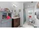 Guest bathroom with wooden vanity, and built in cabinet storage and decorative accents at 241 Fannie B Rd., Conway, SC 29526