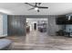 Open living area with wood flooring and view into the modern kitchen and dining area at 241 Fannie B Rd., Conway, SC 29526