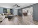 Comfortable living area adjacent to a dining space, with wood floors and modern colors at 241 Fannie B Rd., Conway, SC 29526