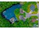 Aerial view of a lovely home on the lake at 2454 Glen Dr., Little River, SC 29566