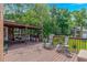 Outdoor deck with seating area and built-in grill is perfect for entertaining at 2454 Glen Dr., Little River, SC 29566