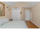 Bedroom featuring hardwood floors, a large closet, and neutral paint color at 2454 Glen Dr., Little River, SC 29566