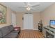Comfortable living area featuring neutral walls, hardwood floors, and a flatscreen TV at 2454 Glen Dr., Little River, SC 29566