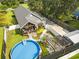 This home's aerial view displays mature landscaping, beautiful backyard, fenced yard and a stunning pool at 2588 Long Avenue Ext., Conway, SC 29526