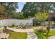 Cozy backyard gathering space with a fire pit and comfortable rocking chairs at 2588 Long Avenue Ext., Conway, SC 29526