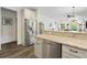 Spacious open-concept kitchen with stainless steel appliances and granite countertops; perfect for entertaining guests at 2588 Long Avenue Ext., Conway, SC 29526