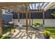 Backyard pergola with outdoor seating, grill, swing chair, and string lights at 2588 Long Avenue Ext., Conway, SC 29526