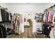 Organized walk-in closet with ample storage space and a clear view into the main bedroom at 2588 Long Avenue Ext., Conway, SC 29526