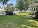 Lush backyard with custom deck, bench, and swing at 312 Trace Run, Myrtle Beach, SC 29588