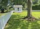 Picturesque backyard with white picket fence and view of a pond at 312 Trace Run, Myrtle Beach, SC 29588