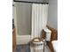 Cozy full bath with wood accent wall and tub shower at 312 Trace Run, Myrtle Beach, SC 29588