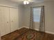 Cozy bedroom with hardwood floors, closet space and lots of natural light at 312 Trace Run, Myrtle Beach, SC 29588