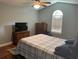 Comfortable bedroom with vaulted ceilings, hardwood floors, dresser and television at 312 Trace Run, Myrtle Beach, SC 29588