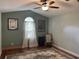 Vaulted bedroom filled with natural light, hardwood floors, and ceiling fan at 312 Trace Run, Myrtle Beach, SC 29588