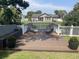 Wood deck with white fence, built-in bench, and lounge chairs at 312 Trace Run, Myrtle Beach, SC 29588