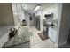 Well-lit kitchen with stainless steel appliances, modern countertops, and white cabinetry at 312 Trace Run, Myrtle Beach, SC 29588
