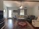 Cozy living room with plush seating, hardwood floors, and ample natural light at 312 Trace Run, Myrtle Beach, SC 29588