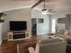 Spacious living room with vaulted ceiling, hardwood floors, and fireplace at 312 Trace Run, Myrtle Beach, SC 29588
