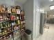 Walk-in pantry with plenty of shelving to accommodate plenty of food and supplies at 312 Trace Run, Myrtle Beach, SC 29588