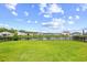 Enjoy serene waterfront views from the backyard, with a lush lawn extending to a tranquil pond at 317 Truce St., Myrtle Beach, SC 29588