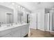 Bright bathroom featuring double sinks, modern fixtures, and plenty of storage at 317 Truce St., Myrtle Beach, SC 29588