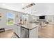 The kitchen features granite counters and views into the living area and backyard at 317 Truce St., Myrtle Beach, SC 29588