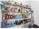 Well-stocked pantry with wire shelving, showcasing an abundance of food items and household supplies at 317 Truce St., Myrtle Beach, SC 29588